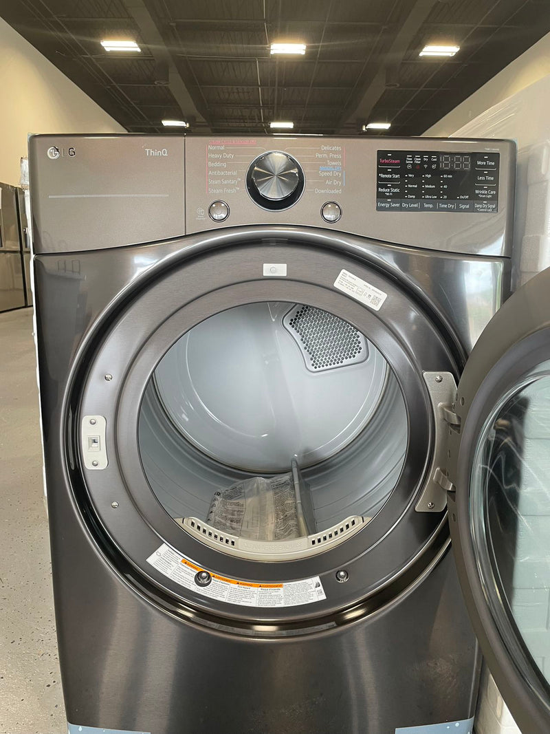 LG 4.5 cu. ft. Front Load Washer with TurboWash 360 and 7.4 cu. ft. GAS Dryer with TurboSteam and Built-In Intelligence